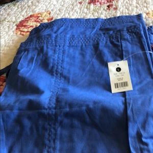 Blue koi pants with tags